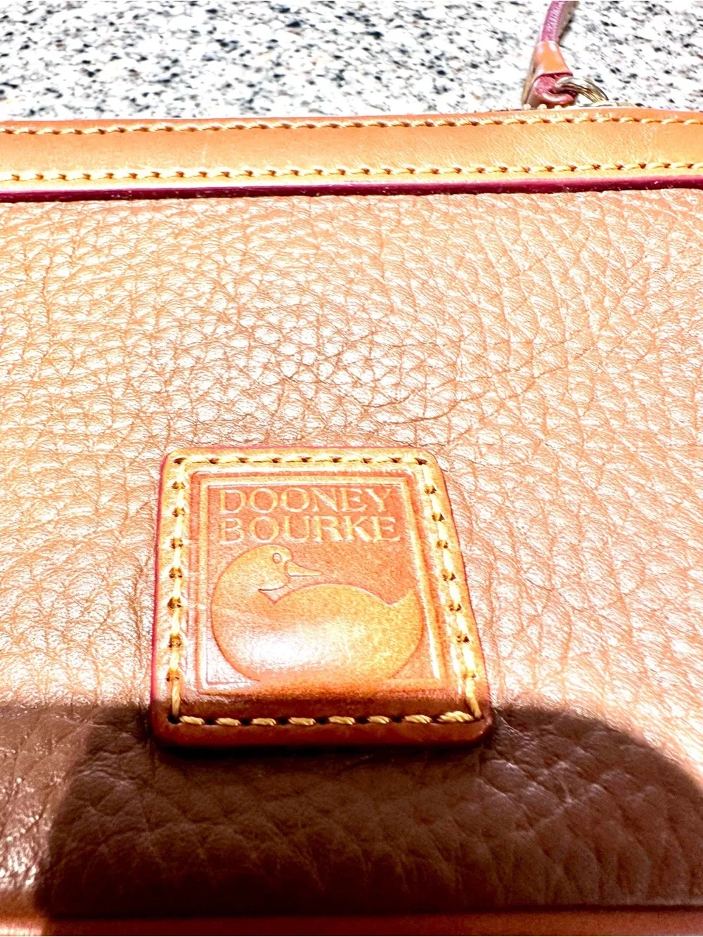 Dooney & Bourke Brown Pebbled Leather Wristlet with Tan Trim